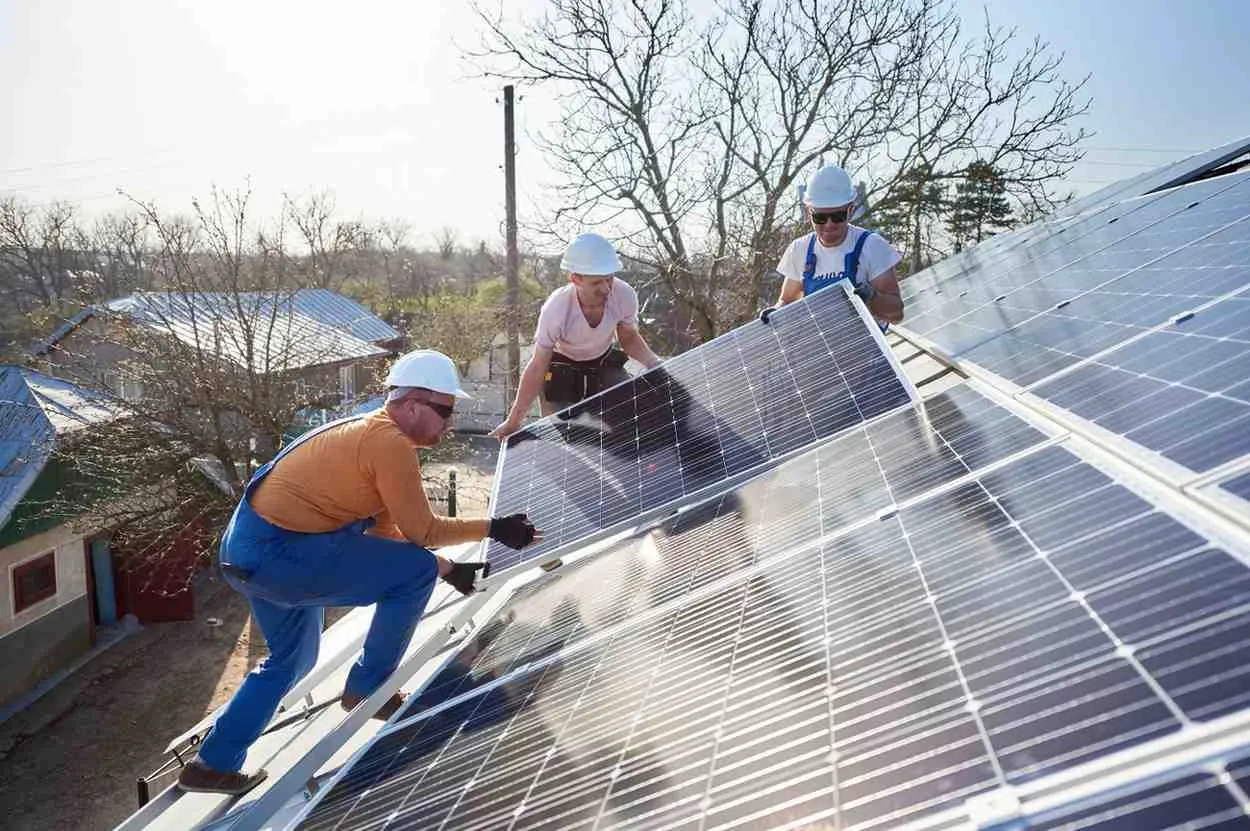 Solar panels being fitted on a home roof